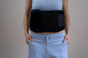 Woman wearing Prime Science Fat Freezing belts on stomach