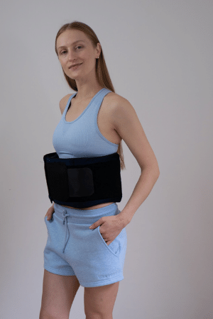 Woman wearing Prime Science Fat Freezing belt on stomach