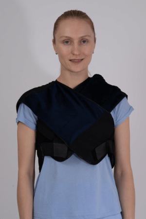 Woman wearing Prime Science Calorie burner vest over shoulders