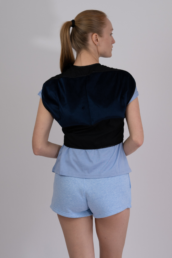 Woman wearing Prime Science Calorie Burner Vest from back